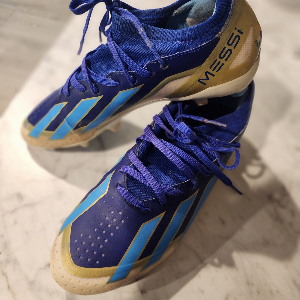 Blue and Gold Soccer Cleats